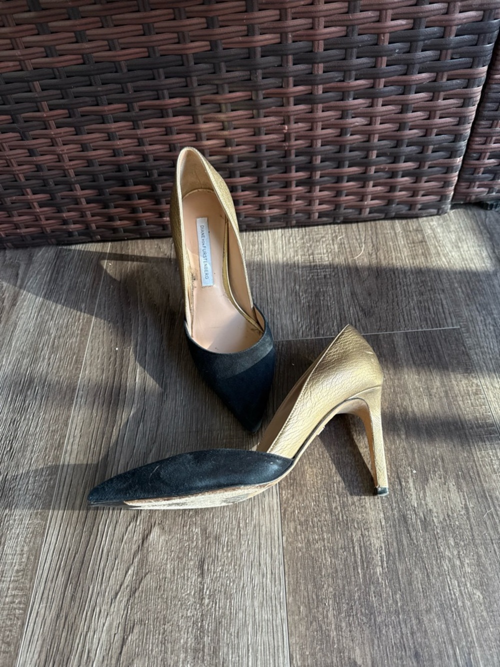 Diane Von Furstenberg Black and Gold Pointed Toe Pumps